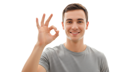 A smiling man, radiating positivity, confidently makes the OK hand gesture. His eyes sparkle with friendliness.