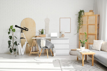 Interior of office with workplace, plants and telescope