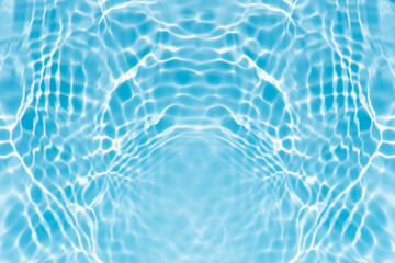 Blue water with ripples on the surface. Defocus blurred transparent blue colored clear calm water surface texture with splashes and bubbles. Water waves with shining pattern texture background.