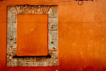 Sealed Stone Window Frame on Orange Wall (Mexico City, Mexico)