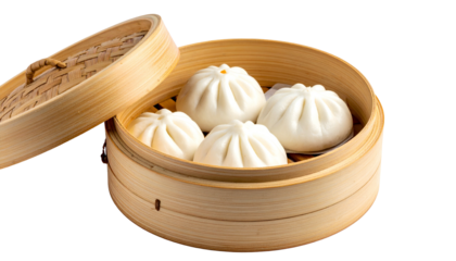 Steamed fluffy buns sit inside a bamboo steamer, partially open, on a transparent backdrop