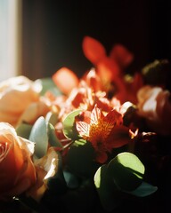 sunlit bouquet with orange and white flowers