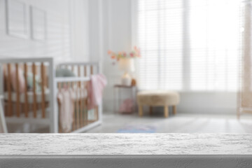 Empty table in baby room. Space for design