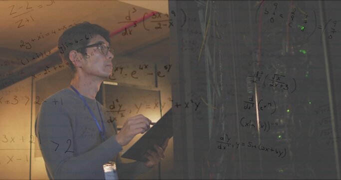 IT technician holding clipboard and inspecting server racks in data center, with LEDs, copy space