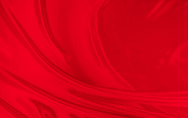 Black red satin dark fabric texture luxurious shiny that is abstract silk cloth background with patterns soft waves blur beautiful.