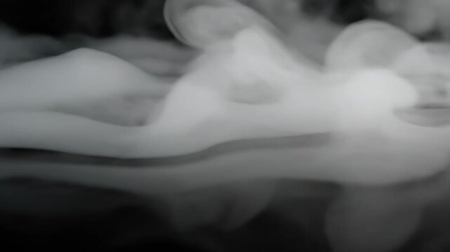 Abstract Smoke: Soft, swirling plumes of vapor create an ethereal and abstract composition, evoking a sense of mystery and intrigue.