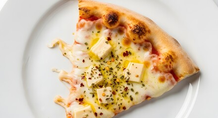 A slice of pizza with melted cheese, herbs, and butter on a white plate.
