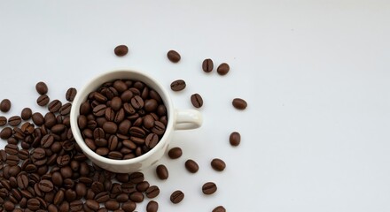 Coffee Beans Abundance: A captivating overhead perspective captures the rich aroma and texture of freshly roasted coffee beans. spilling from a cup, on a simple surface, evokes a feeling of warmth.