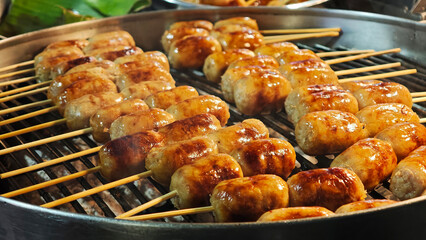Grilled Isaan sausage in the market