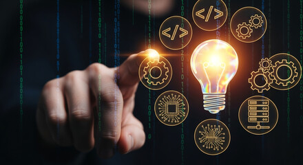 Hand interacting with a glowing lightbulb surrounded by technology and coding icons, representing innovation, idea generation, digital solutions, and creative development.