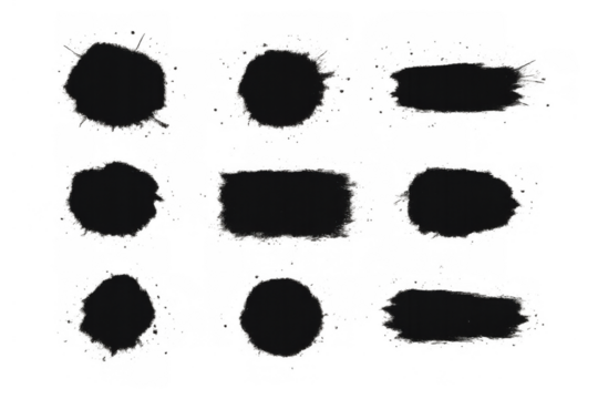 Black ink splashes and brush strokes creating a grunge design element set on a transparent background