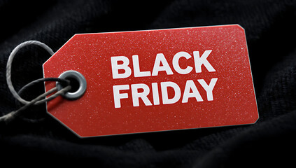 A red price tag with the words BLACK FRIDAY displayed prominently, indicating a special sale or discount
