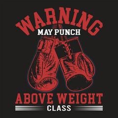 Warning may punch above weight class with red boxing gloves hanging down on a black background, ideal for fitness apparel or gym promotions