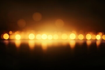 Soft yellow bokeh lights reflected on a dark surface