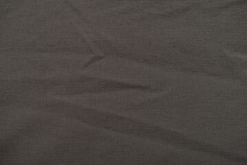 Texture of brown green nylon canvas fabric fashion autumn clothing