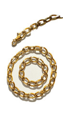 Golden Chain Necklace and Bracelet Jewelry on Warm Background