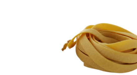 Golden Fettuccine Pasta Nest Soft Yellow Background Studio Lighting