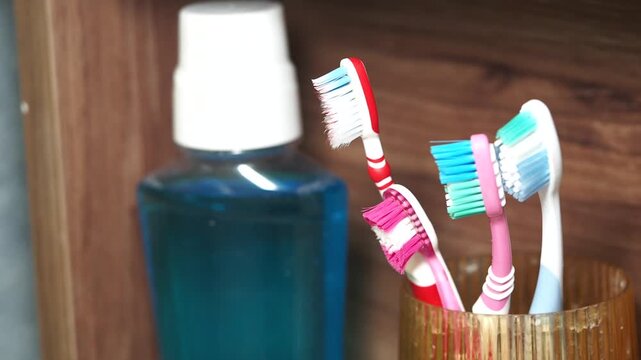 Bright colors of dental care items in bathroom setting