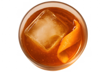 Old fashioned cocktail with whiskey, ice cube, and orange peel from top view, transparent background