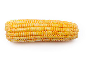 Fresh peeled corn cob lying on white surface