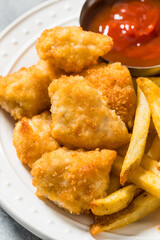 Healthy Breaded Chicken Nuggets and French Fries
