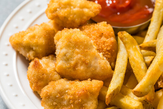 Healthy Breaded Chicken Nuggets and French Fries