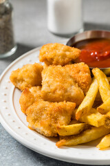 Healthy Breaded Chicken Nuggets and French Fries