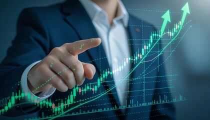 Hand pointing at digital graph showing business growth and financial success