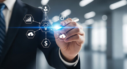 Businessman interacting with digital interface displaying business and technology icons in suit