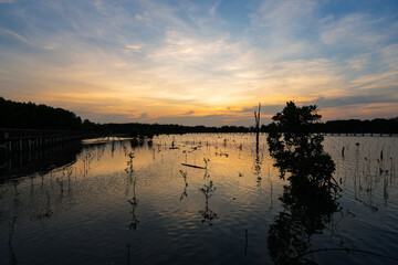Sunset sky clouds in the Evening with Golden orange sunlight in golden hour, Dusk sky background