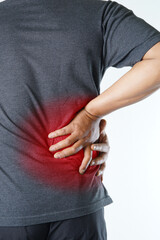Man experiencing lower back pain seeking relief and comfort from muscle tension, ideal for health campaigns