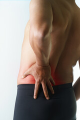 Muscle pain relief needed, Man with lower back pain, seeking medical attention and therapy