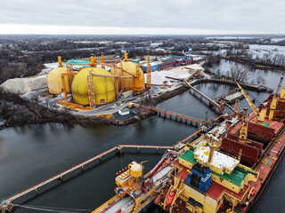 Cargo Ship Unloading at an Industrial Plant on the Delaware River