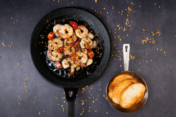 Sizzling Garlic Shrimp with Cherry Tomatoes and Toasted Bread