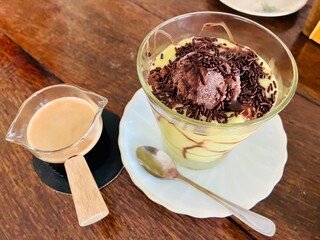 Top view of avocado coffee: espresso shot with avocado smeethie and chocolate ice-cream