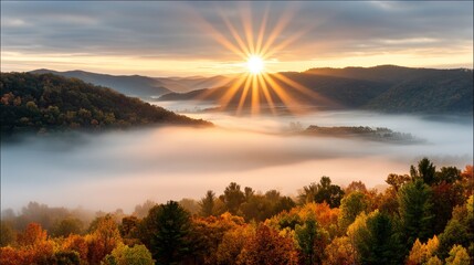 Fototapeta premium Breathtaking sunrise over misty mountains.