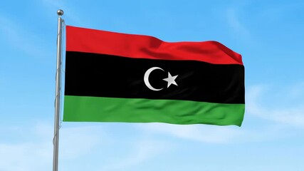 Libya National Flag Waving in Clear Blue Sky with Bright Colors
