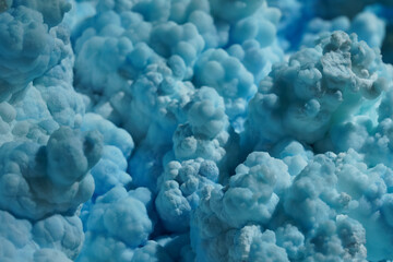 Natural blue aragonite mineral with pale blue to turquoise coloration. Calcium carbonate crystals...