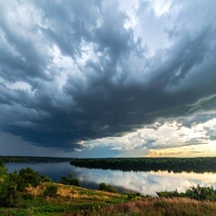 Dramatic Skies Over Serene Lake Landscape at Dusk.