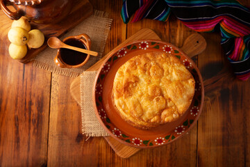 Mexican Buñuelos. Traditional food at Christmas and winter holidays in Mexico, these are fried flour tortillas sprinkled with sugar or covered in a syrup made with piloncillo, cinnamon, and guava.