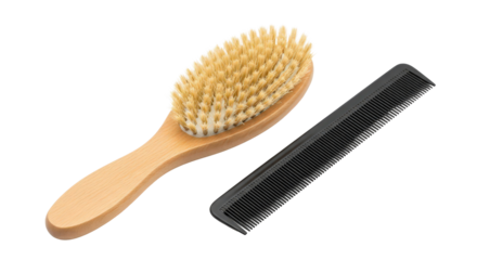 Wooden baby hair brush and black comb isolated on transparent background