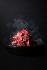 Freshly Cut Raw Beef Cubes with Rising Steam