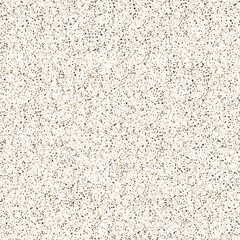 Seamless imitation of granite stone texture. Black and brown speckles on a cream background.