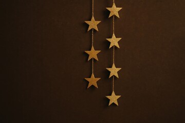 Golden stars on brown background.