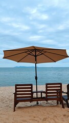 beach chairs and umbrella on the beach