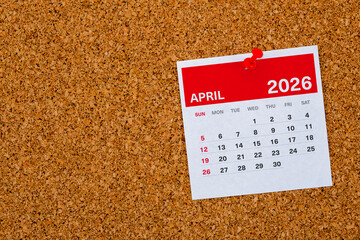 April 2026 Calendar Page Pinned on Cork Board