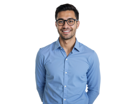Young man smiling confidently in blue shirt against plain background during a studio shoot