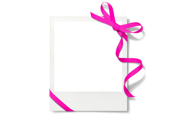 ピンク色のリボンで飾られたポラロイド写真の、画像合成用フレーム