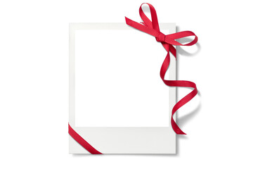 赤いリボンで飾られたポラロイド写真の、画像合成用フレーム