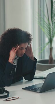 Stress, laptop and business woman with headache for system glitch, financial error or workload. Accountant, person or tech with migraine in office for auditing mistake, brain fog or deadline pressure